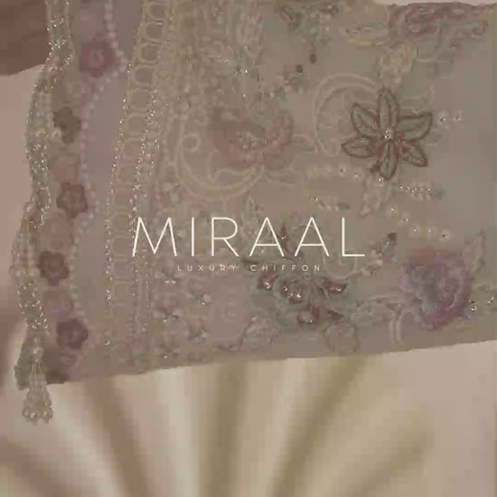 designer suits for women