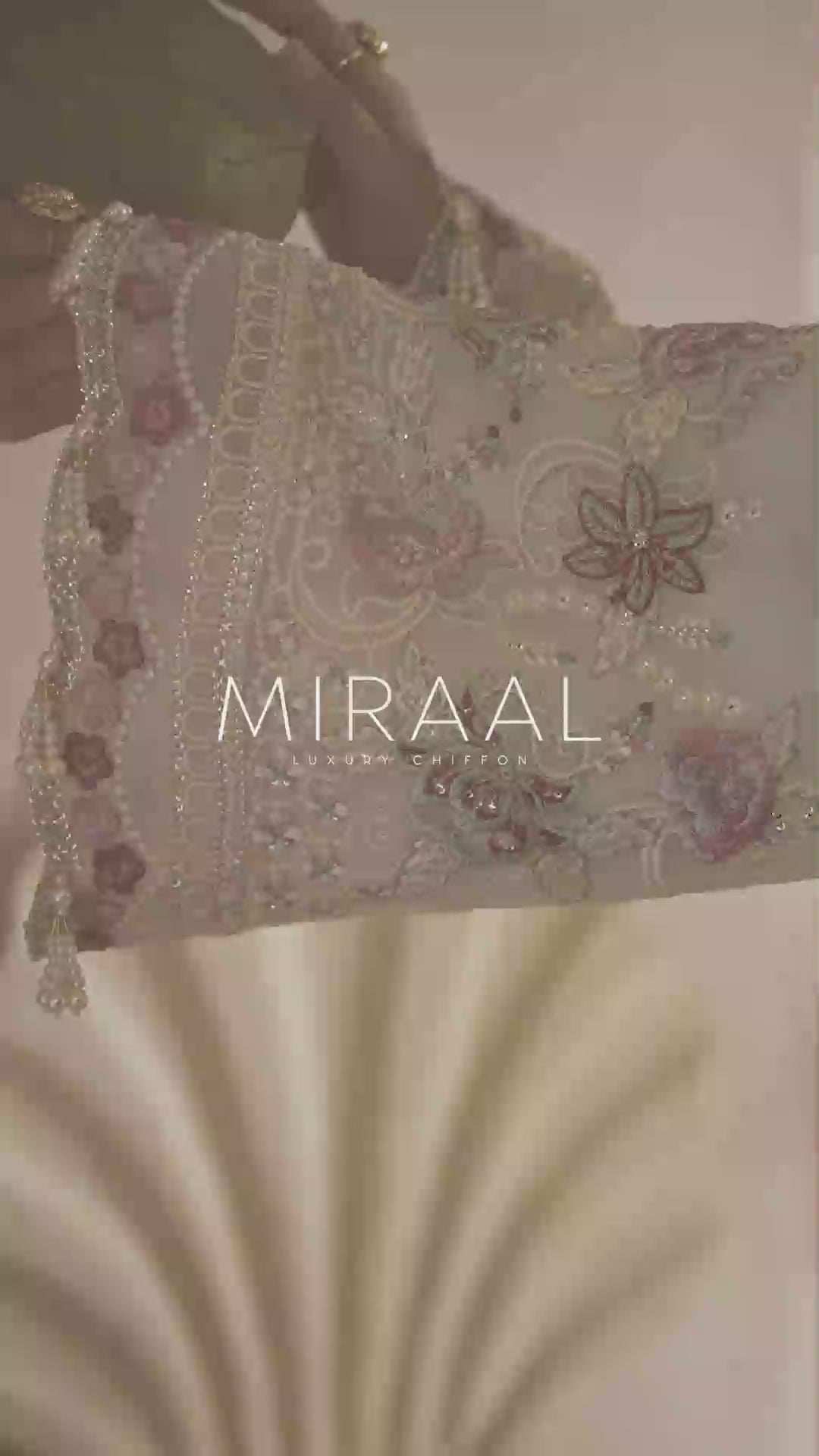designer suits for women
